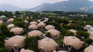 ‘Japan Dome Houses’, in Aso, Japan. The factory made polystyrene foam homes are sold all over Japan as they have shown to be earthquake-proof.