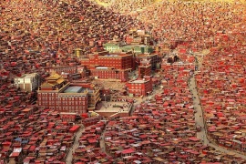 A Buddhist 'seda' or shrine n China surrounded by red houses