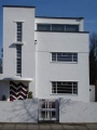 Moderne House in Surrey used as background in 'The Veiled Lady' and as Claude Anton's house in 'Wasp's Nest' (PhotoCredit: Joan Street)