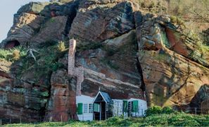 The last ‘troglodyte’ dwellings occupied in England is a cave-house excavated from the local sandstone at Kinver Edge, Staffordshire.