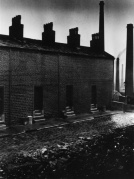 Windowless terraced houses in Halifax, England. Photographed by Bill Brandt