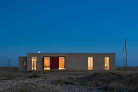 Converted WWII pumping station on Dungeness Beach by architects Johnson Naylor 2018. the building was built during world war two as a pumping station to send fuel though undersea pipes to France and support the D-Day landings.