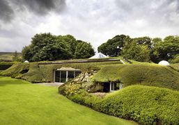 The 'UnderhillHouse House' a 20th-century house in West Yorkshire, dubbed the ‘Hobbit house’, believed to be first modern earth-sheltered house in Britain.