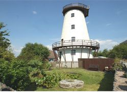 Groes Onnen Windmill, Holywell, Wales. Built in the late 18th century the Grade II listed building is a rare example of a full-height windmill.
